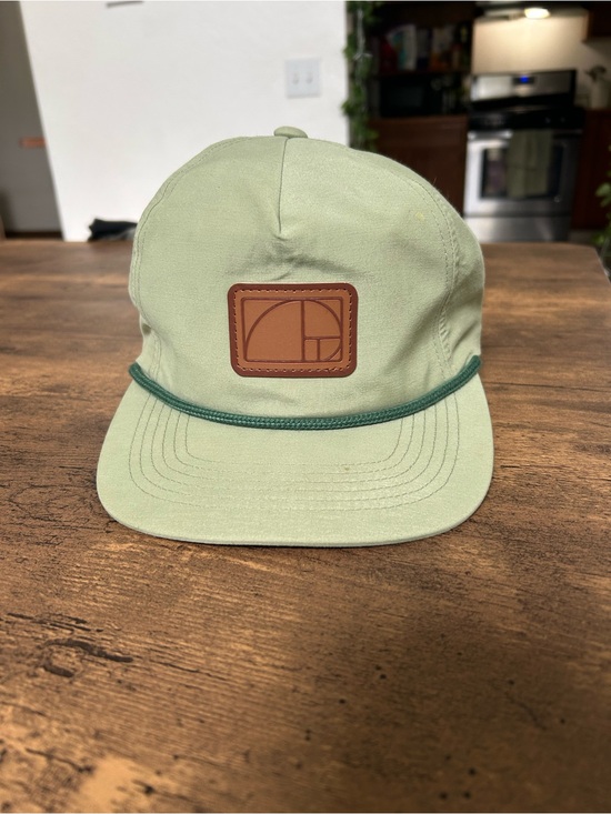 Other - Unisex Light green rope trim hat with flat bill and faux leather patch